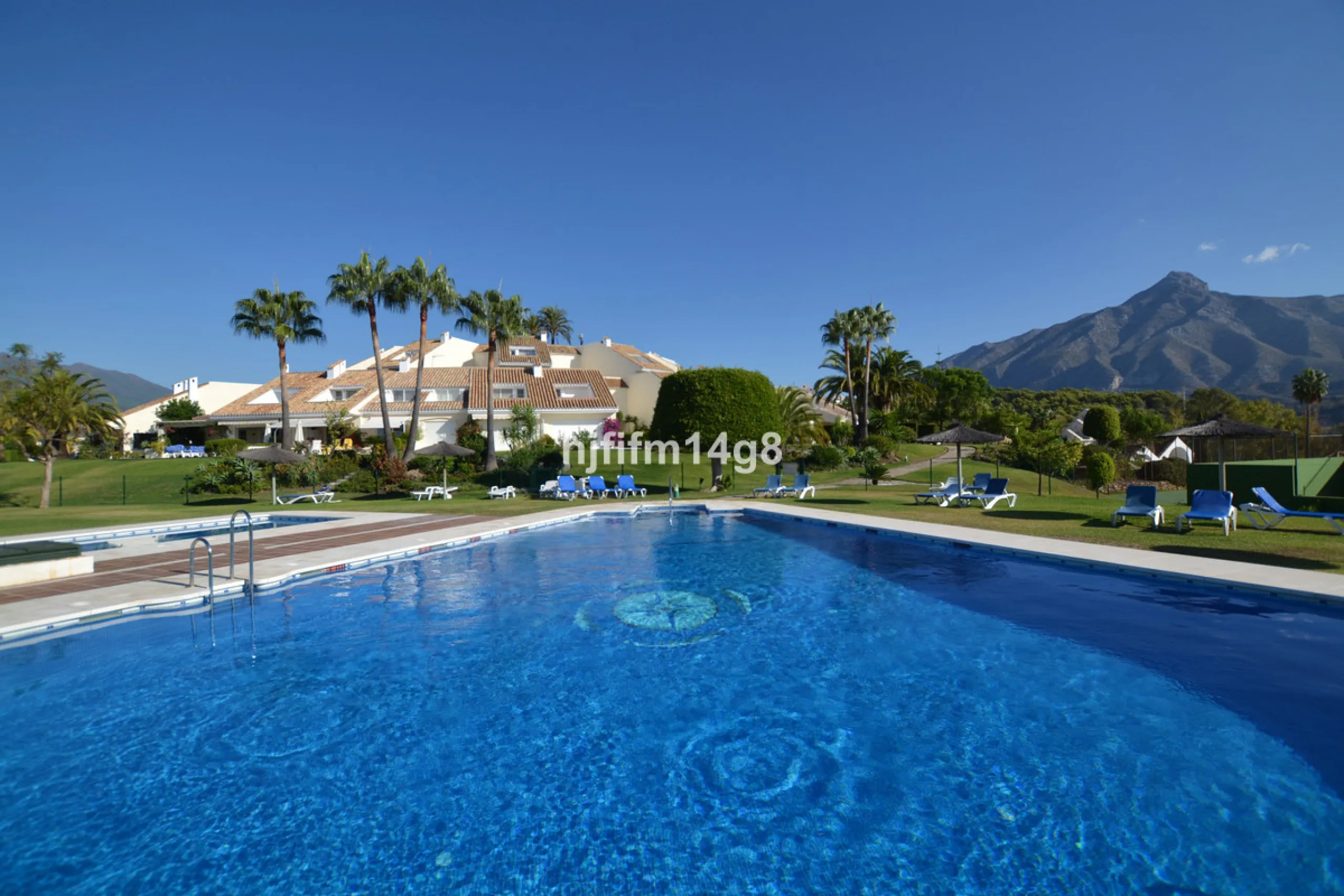 Discover this rare opportunity to own a charming townhouse for sale in Los Altos de Aloha, one of the most desirable residential complexes in Nueva Andalucía, Marbella. Perfectly positioned frontline to the pool, this beautifully maintained property offer