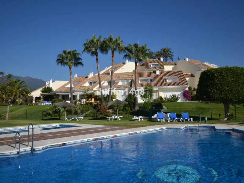 Discover this rare opportunity to own a charming townhouse for sale in Los Altos de Aloha, one of the most desirable residential complexes in Nueva Andalucía, Marbella. Perfectly positioned frontline to the pool, this beautifully maintained property offer