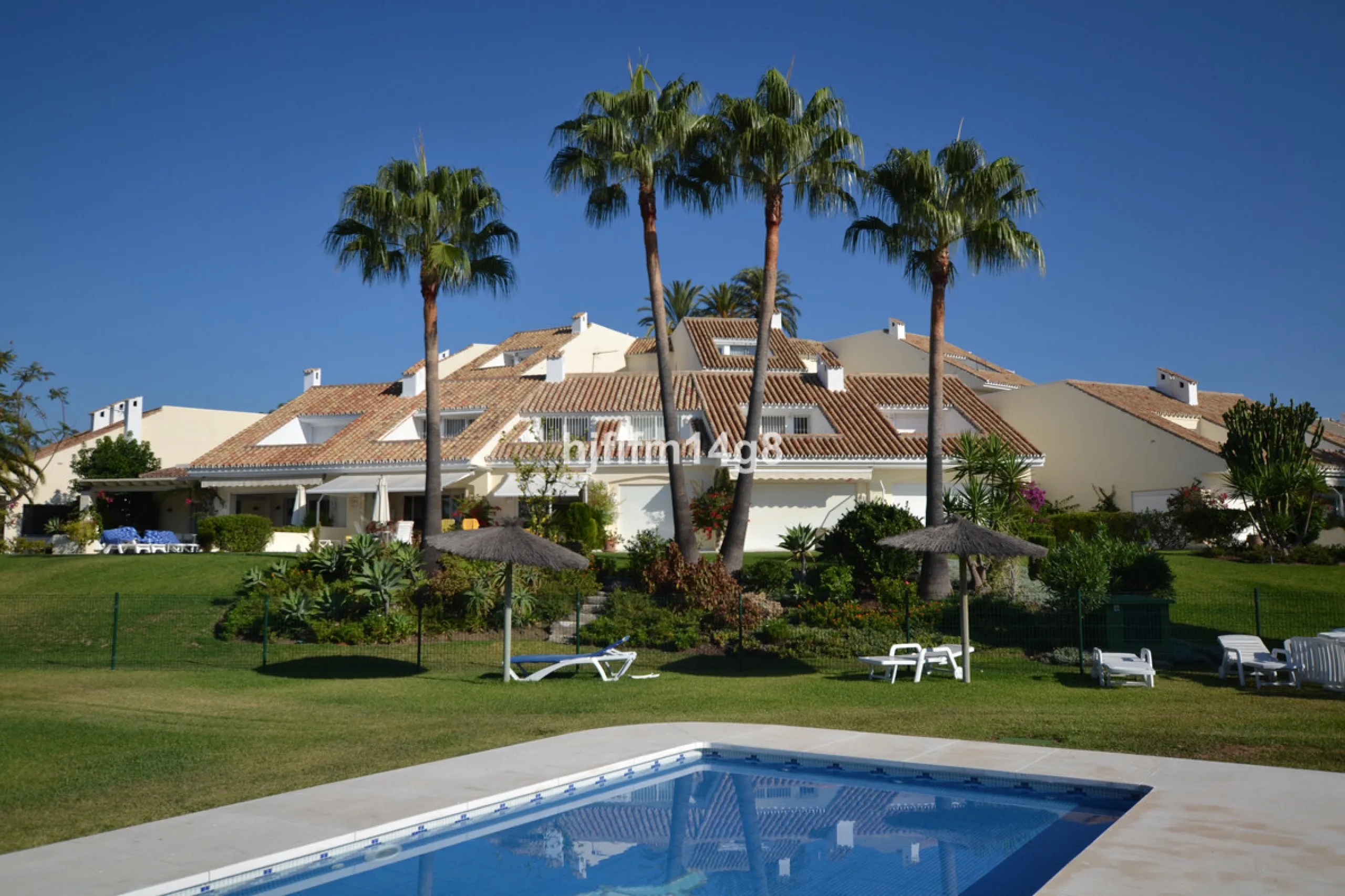 Discover this rare opportunity to own a charming townhouse for sale in Los Altos de Aloha, one of the most desirable residential complexes in Nueva Andalucía, Marbella. Perfectly positioned frontline to the pool, this beautifully maintained property offer