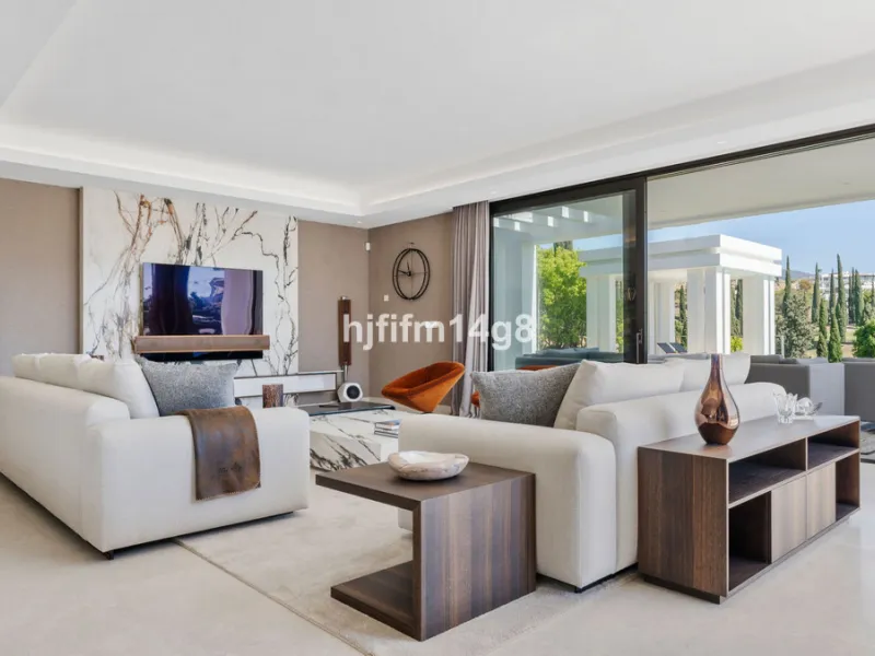 Discover an exceptional key-ready luxury villa for sale in the prestigious Los Flamingos Golf Resort, one of the most sought-after residential areas on the Costa del Sol, home to the world-famous Villa Padierna. This frontline golf property offers uninter