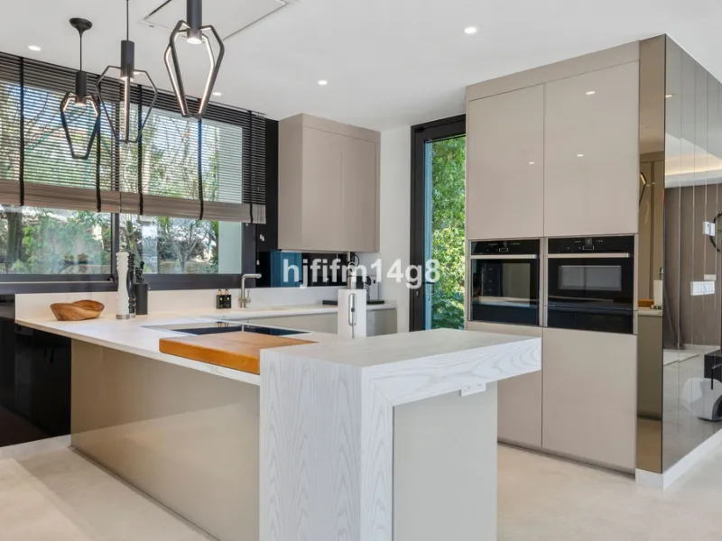Discover an exceptional key-ready luxury villa for sale in the prestigious Los Flamingos Golf Resort, one of the most sought-after residential areas on the Costa del Sol, home to the world-famous Villa Padierna. This frontline golf property offers uninter