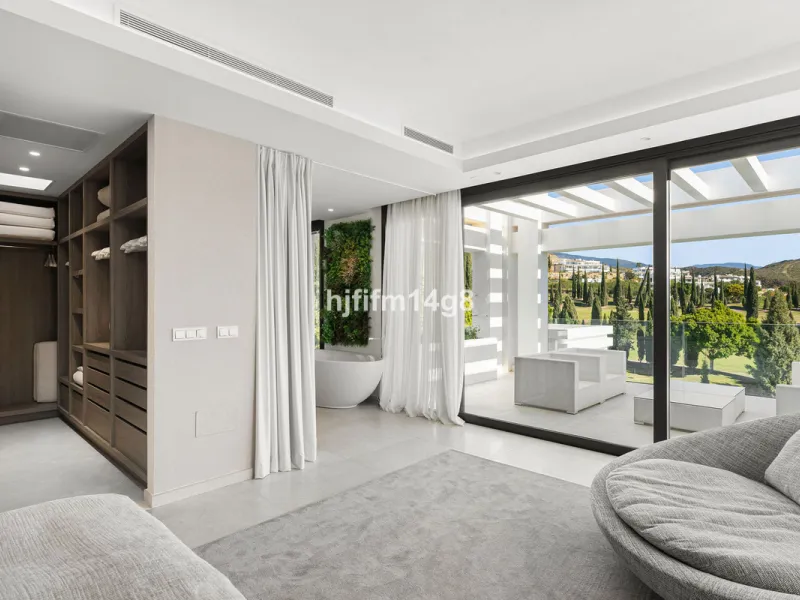 Discover an exceptional key-ready luxury villa for sale in the prestigious Los Flamingos Golf Resort, one of the most sought-after residential areas on the Costa del Sol, home to the world-famous Villa Padierna. This frontline golf property offers uninter