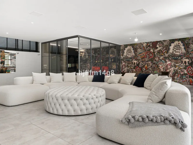 Discover an exceptional key-ready luxury villa for sale in the prestigious Los Flamingos Golf Resort, one of the most sought-after residential areas on the Costa del Sol, home to the world-famous Villa Padierna. This frontline golf property offers uninter
