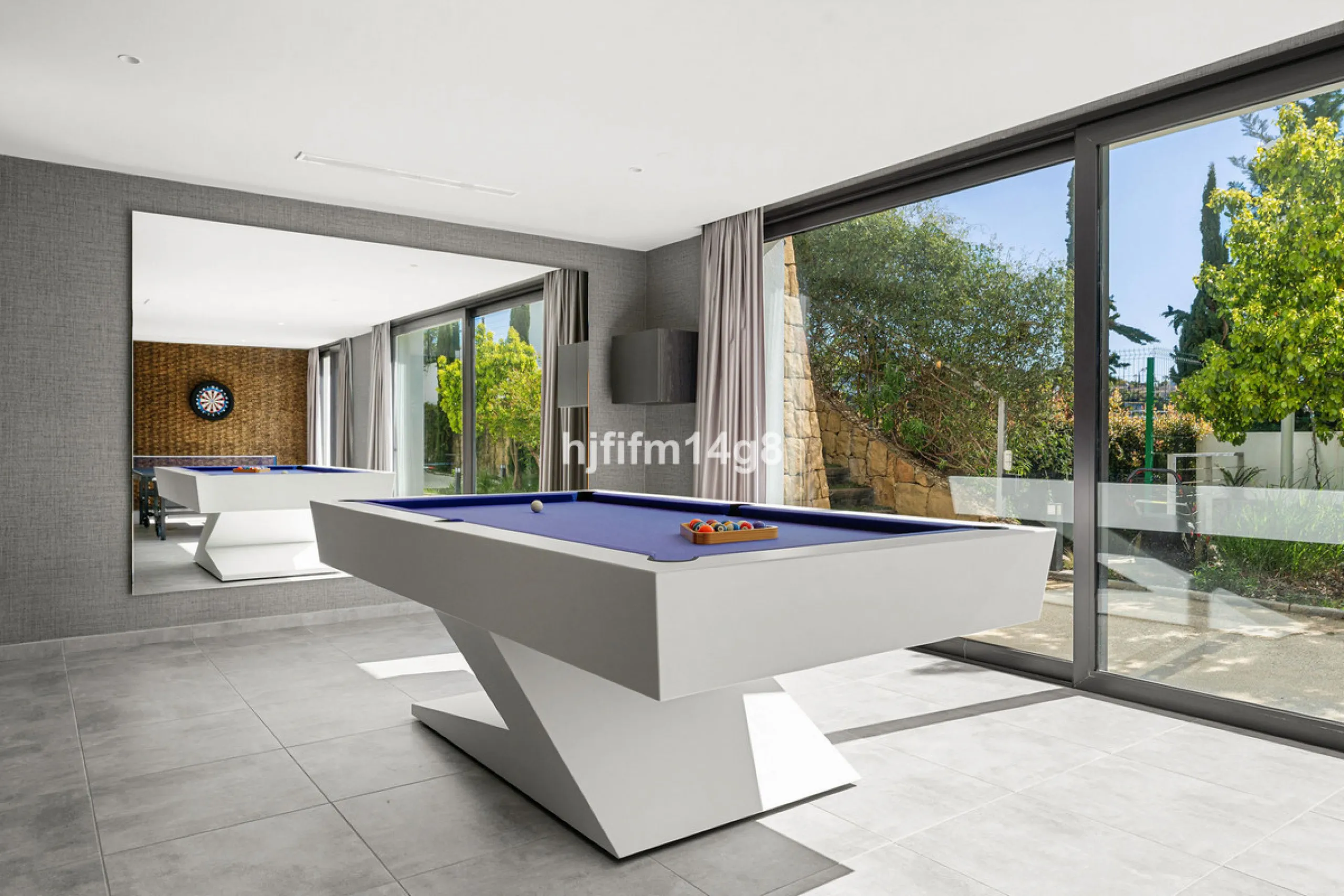 Discover an exceptional key-ready luxury villa for sale in the prestigious Los Flamingos Golf Resort, one of the most sought-after residential areas on the Costa del Sol, home to the world-famous Villa Padierna. This frontline golf property offers uninter