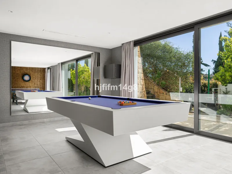 Discover an exceptional key-ready luxury villa for sale in the prestigious Los Flamingos Golf Resort, one of the most sought-after residential areas on the Costa del Sol, home to the world-famous Villa Padierna. This frontline golf property offers uninter