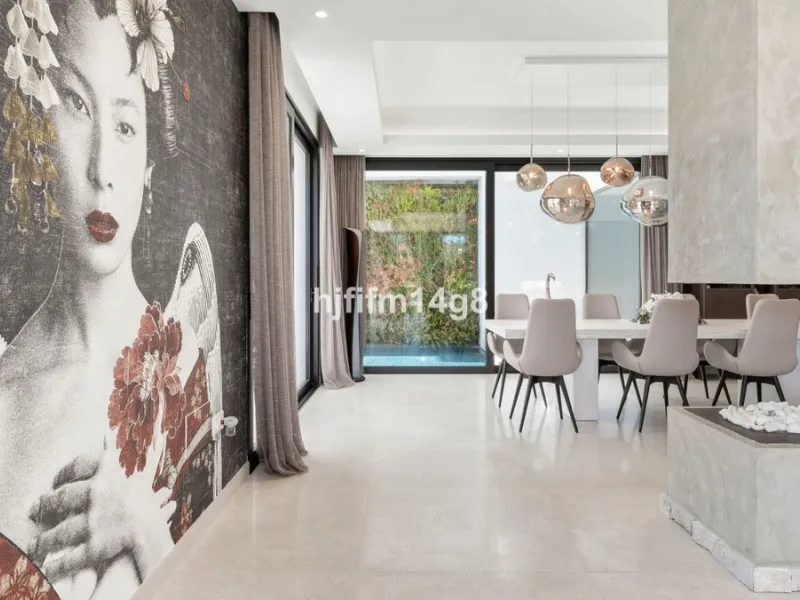 Discover an exceptional key-ready luxury villa for sale in the prestigious Los Flamingos Golf Resort, one of the most sought-after residential areas on the Costa del Sol, home to the world-famous Villa Padierna. This frontline golf property offers uninter