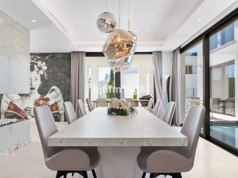 Discover an exceptional key-ready luxury villa for sale in the prestigious Los Flamingos Golf Resort, one of the most sought-after residential areas on the Costa del Sol, home to the world-famous Villa Padierna. This frontline golf property offers uninter