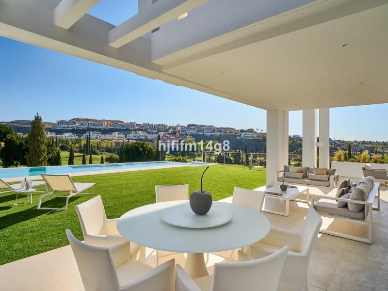 Discover an exceptional key-ready luxury villa for sale in the prestigious Los Flamingos Golf Resort, one of the most sought-after residential areas on the Costa del Sol, home to the world-famous Villa Padierna. This frontline golf property offers uninter