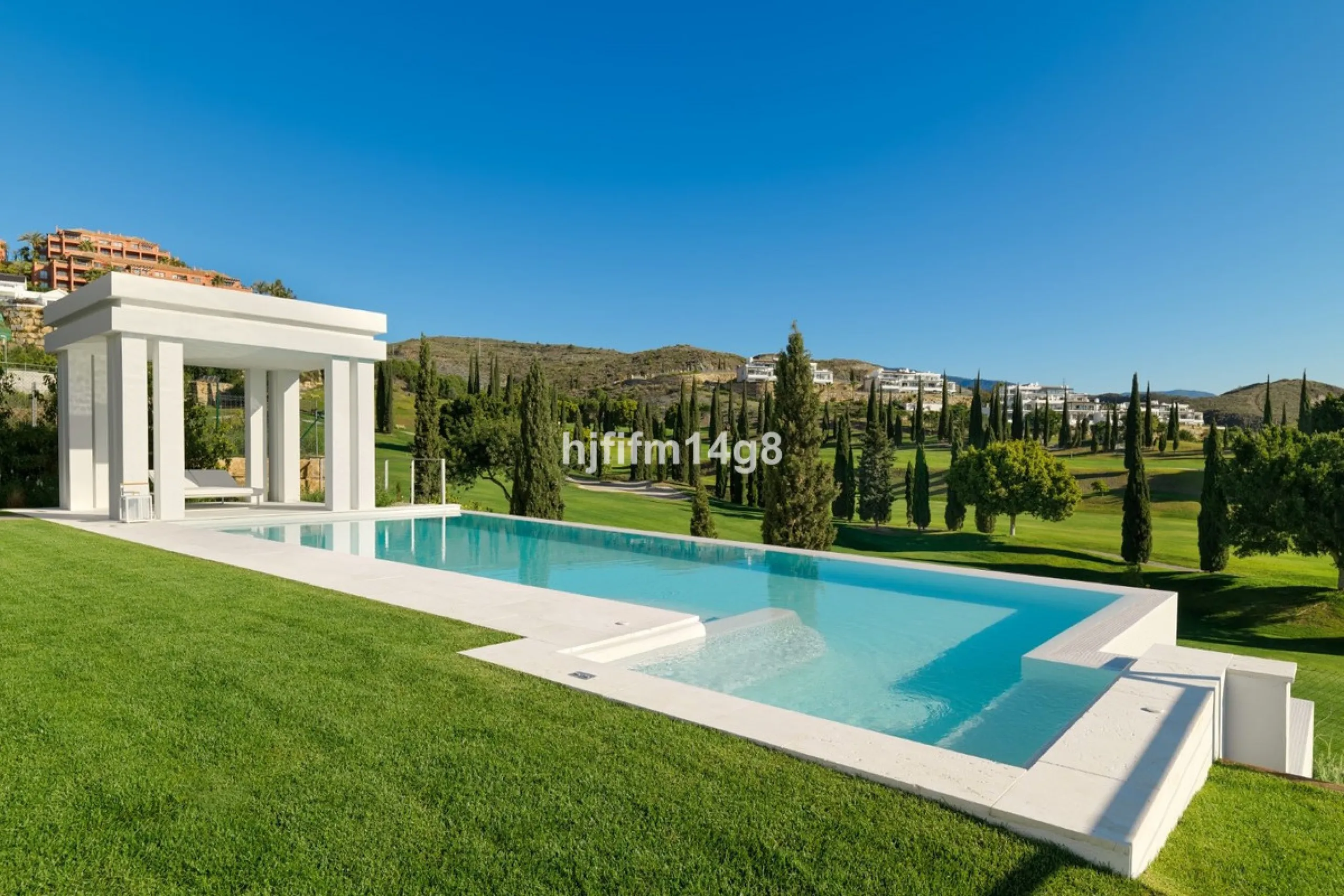 Discover an exceptional key-ready luxury villa for sale in the prestigious Los Flamingos Golf Resort, one of the most sought-after residential areas on the Costa del Sol, home to the world-famous Villa Padierna. This frontline golf property offers uninter