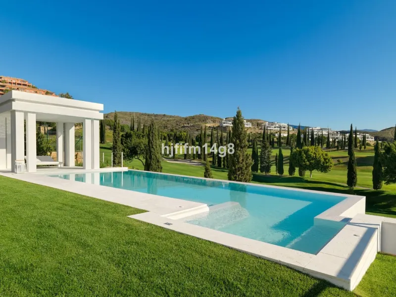 Discover an exceptional key-ready luxury villa for sale in the prestigious Los Flamingos Golf Resort, one of the most sought-after residential areas on the Costa del Sol, home to the world-famous Villa Padierna. This frontline golf property offers uninter