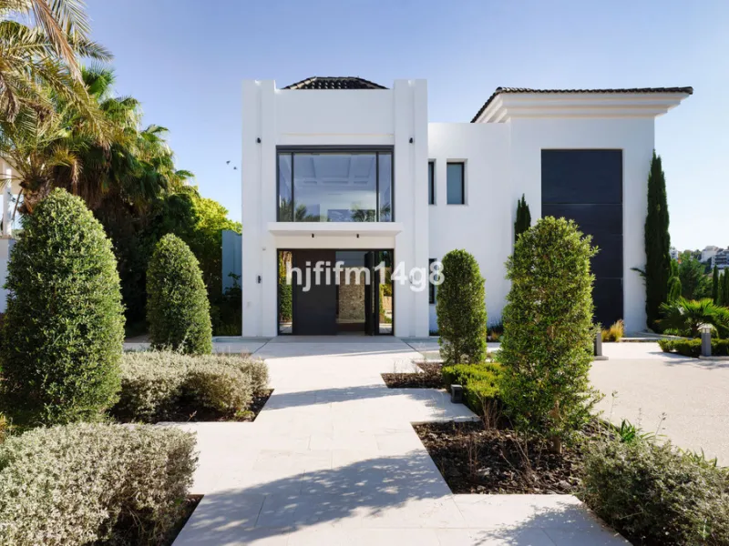 Discover an exceptional key-ready luxury villa for sale in the prestigious Los Flamingos Golf Resort, one of the most sought-after residential areas on the Costa del Sol, home to the world-famous Villa Padierna. This frontline golf property offers uninter