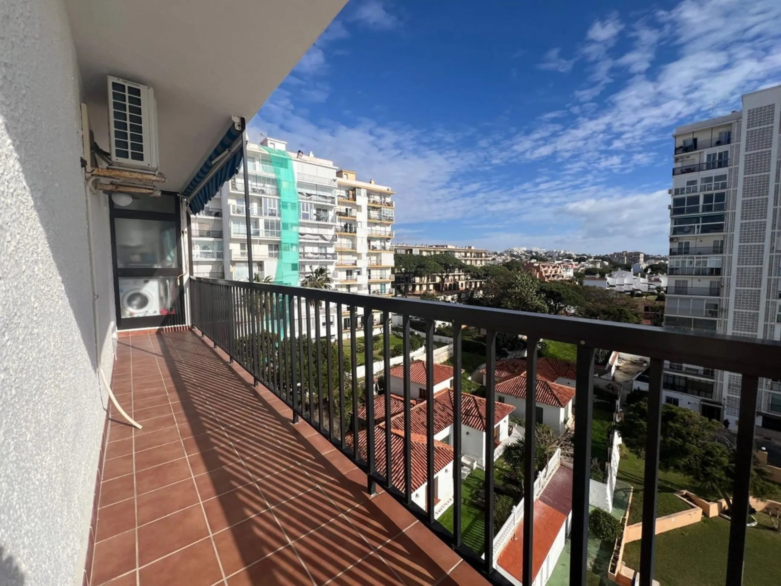 Discover a true beachfront gem in Calahonda. This fully renovated corner apartment, located on the front line of the beach, stands out for an exceptional and rarely found feature: a large wraparound terrace that surrounds almost the entire property, creat