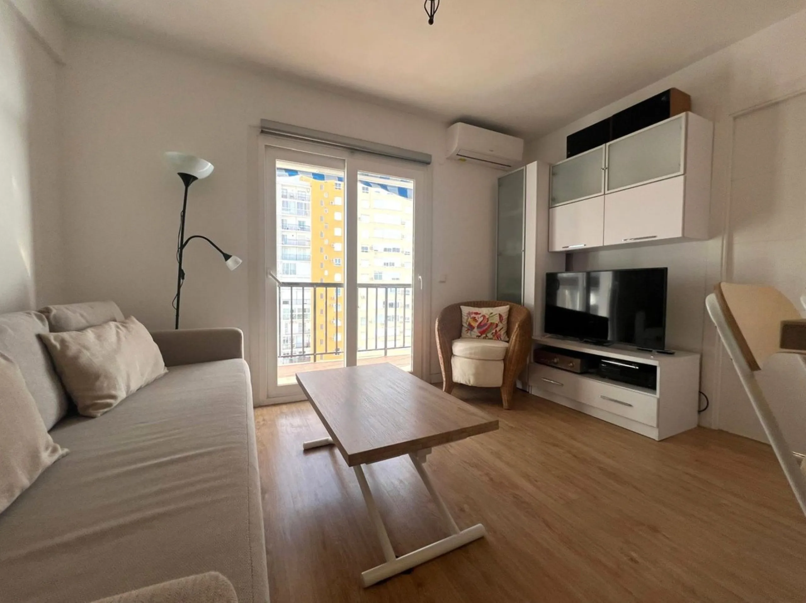 Discover a true beachfront gem in Calahonda. This fully renovated corner apartment, located on the front line of the beach, stands out for an exceptional and rarely found feature: a large wraparound terrace that surrounds almost the entire property, creat