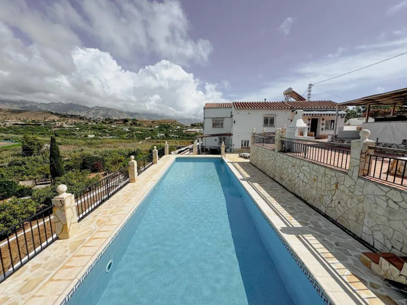 Situated in one of Nerja's most desirable residential areas, this exceptional villa enjoys the best of both worlds - peaceful countryside surroundings with spectacular sea views, while remaining just minutes from the heart of town. Located only 750m from 