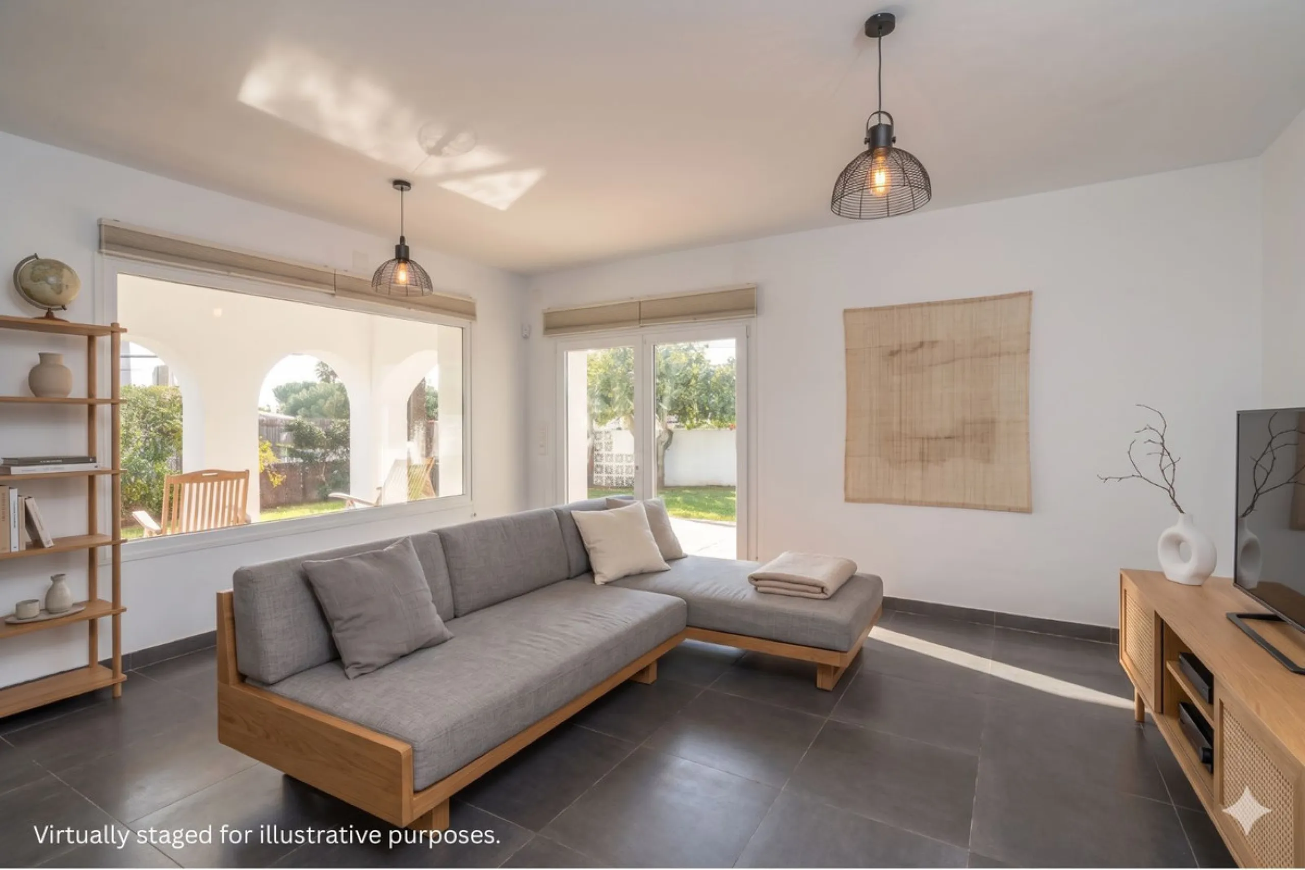 This modern villa has been recently renovated and sits in a fantastic location just 500 metres from the beach,  between La Cala de Mijas and Fuengirola. The home has a bright, contemporary feel throughout, with large windows that open onto the garden and 