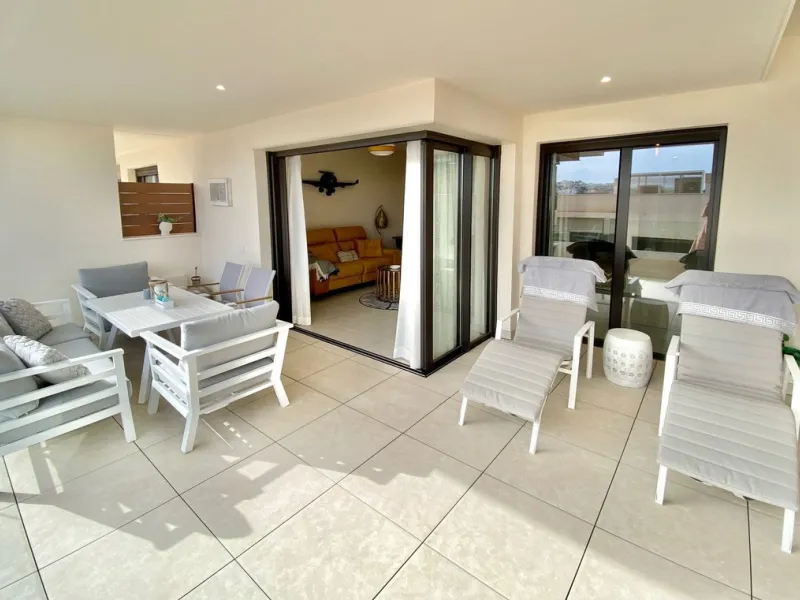 YOUR SECOND HOME AWAITS YOU! Discover refined Mediterranean living in this stylish contemporary apartment in the highly desirable area of Cala de Mijas, Mijas Costa. Nestled within an exclusive gated community (2021)and just a short stroll from the vibran