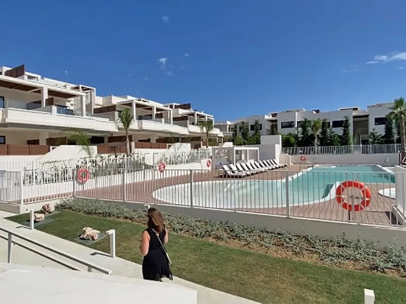 YOUR SECOND HOME AWAITS YOU! Discover refined Mediterranean living in this stylish contemporary apartment in the highly desirable area of Cala de Mijas, Mijas Costa. Nestled within an exclusive gated community (2021)and just a short stroll from the vibran
