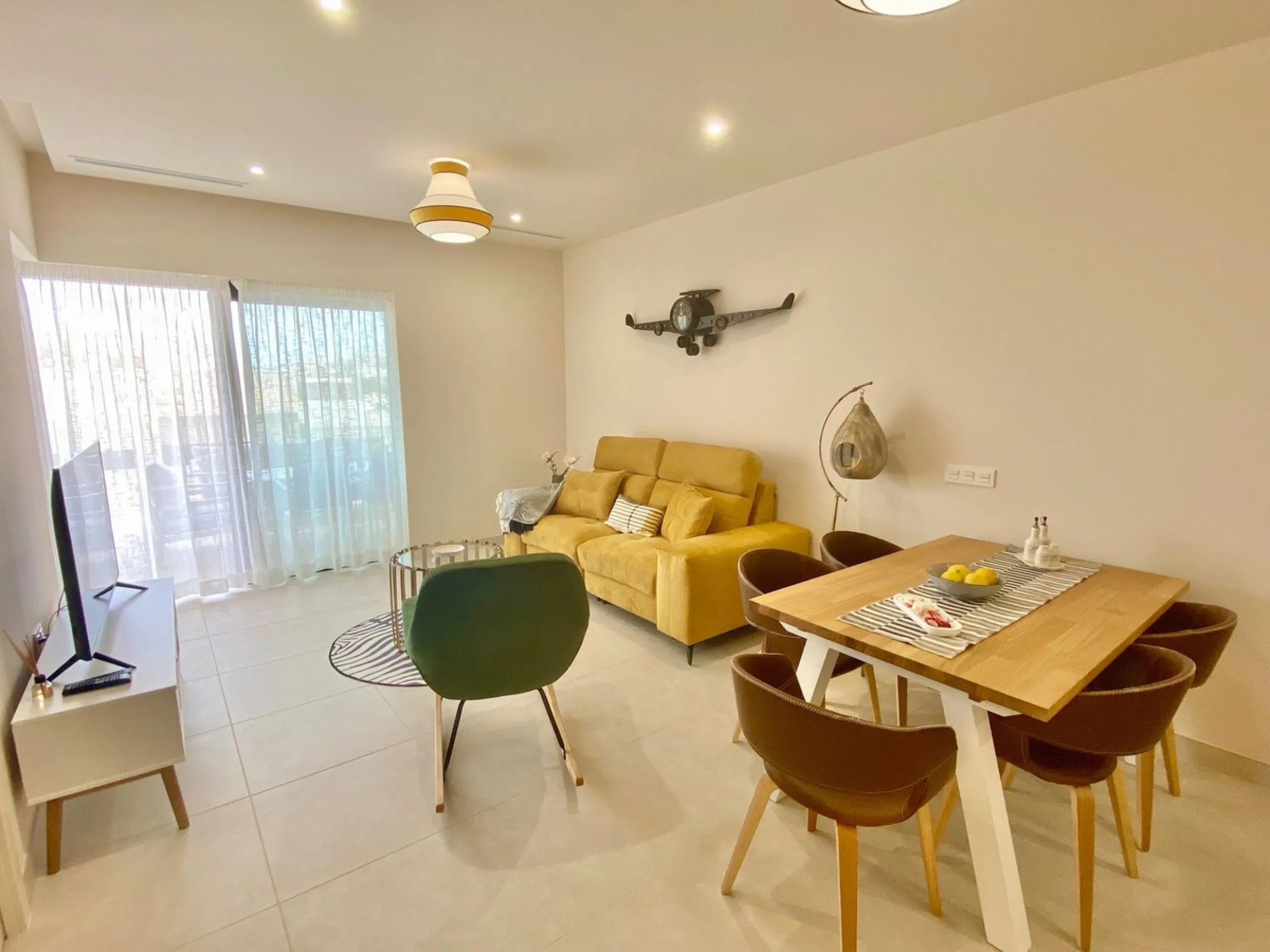 YOUR SECOND HOME AWAITS YOU! Discover refined Mediterranean living in this stylish contemporary apartment in the highly desirable area of Cala de Mijas, Mijas Costa. Nestled within an exclusive gated community (2021)and just a short stroll from the vibran