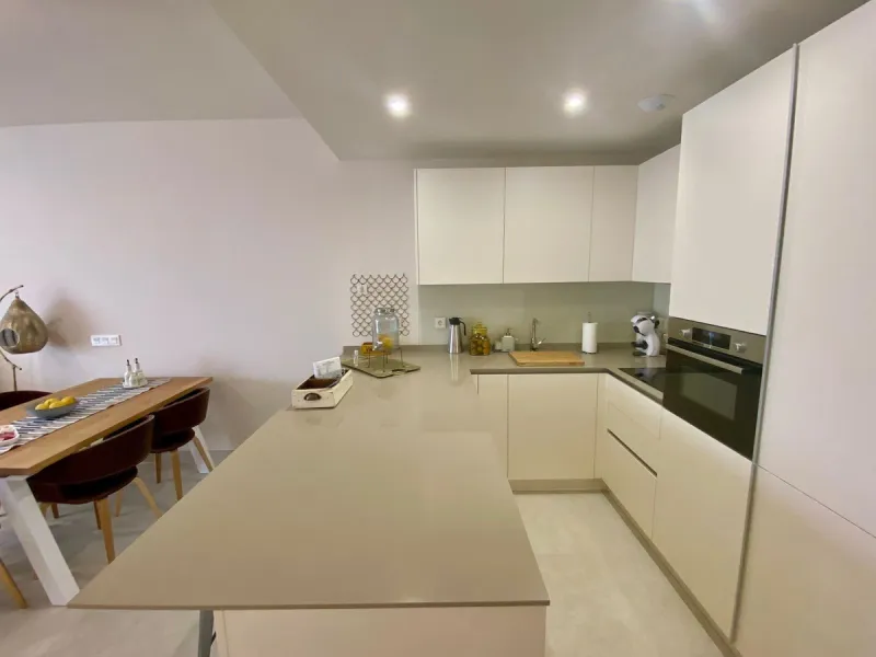 YOUR SECOND HOME AWAITS YOU! Discover refined Mediterranean living in this stylish contemporary apartment in the highly desirable area of Cala de Mijas, Mijas Costa. Nestled within an exclusive gated community (2021)and just a short stroll from the vibran