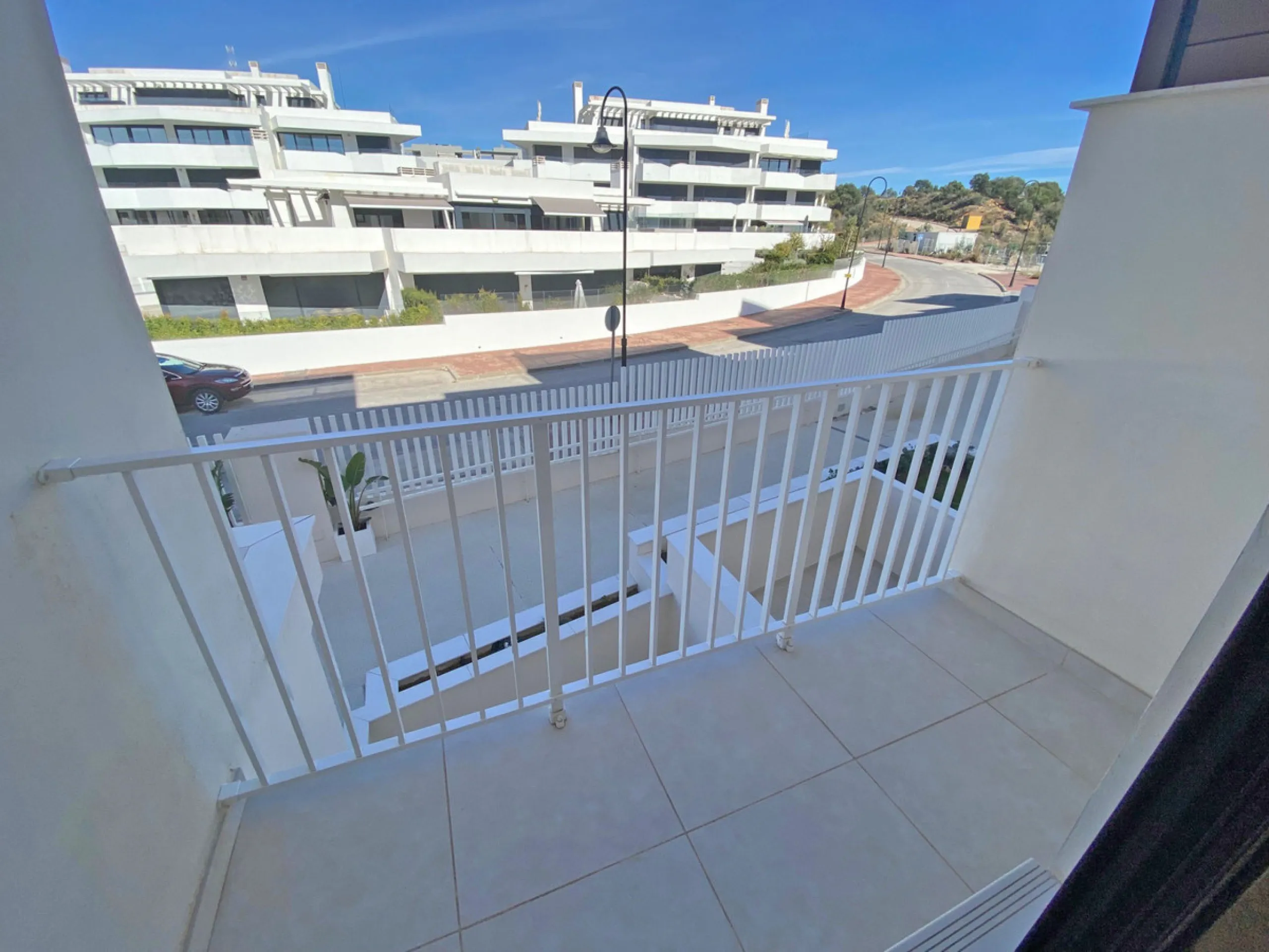 YOUR SECOND HOME AWAITS YOU! Discover refined Mediterranean living in this stylish contemporary apartment in the highly desirable area of Cala de Mijas, Mijas Costa. Nestled within an exclusive gated community (2021)and just a short stroll from the vibran