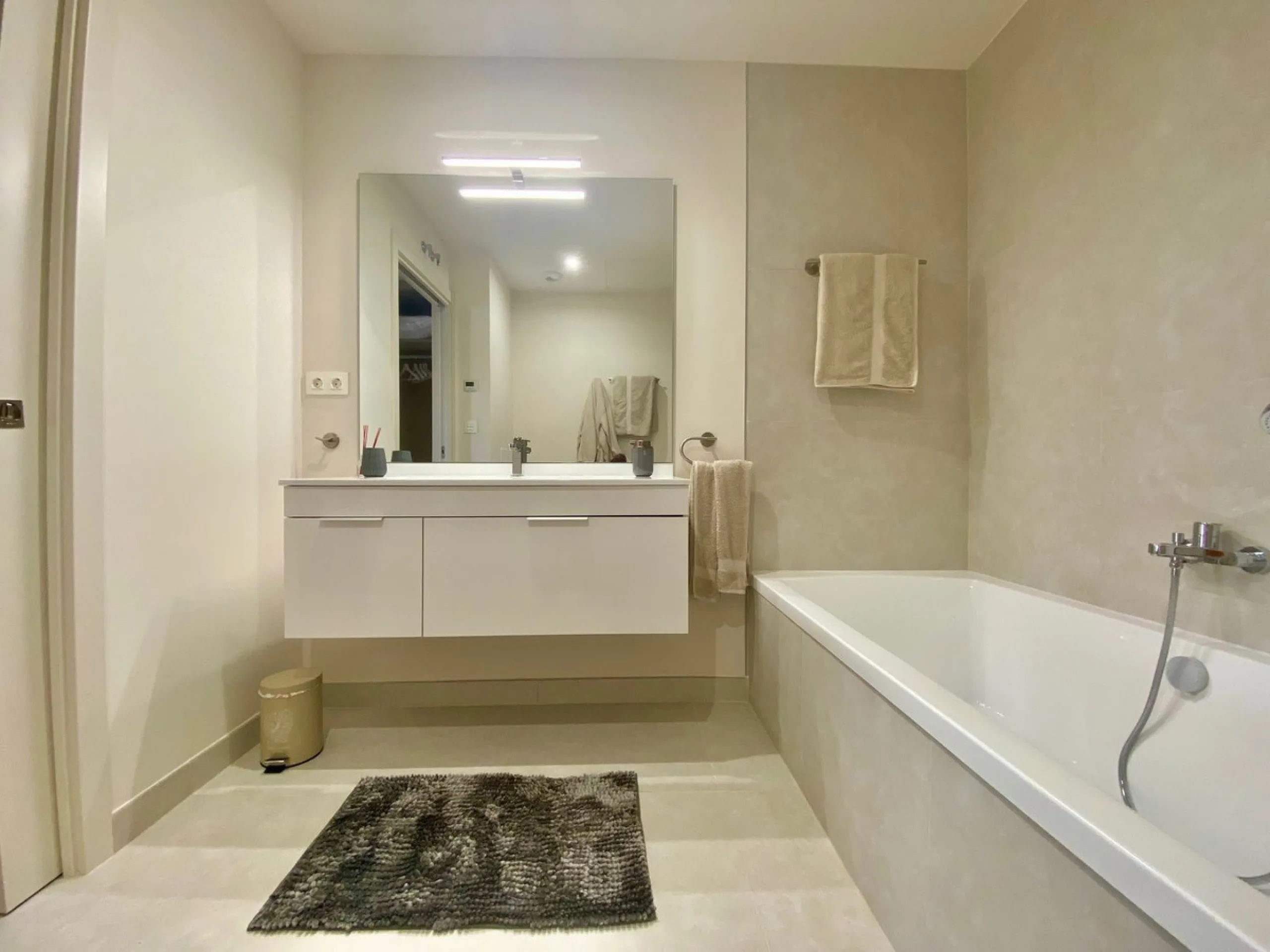 YOUR SECOND HOME AWAITS YOU! Discover refined Mediterranean living in this stylish contemporary apartment in the highly desirable area of Cala de Mijas, Mijas Costa. Nestled within an exclusive gated community (2021)and just a short stroll from the vibran