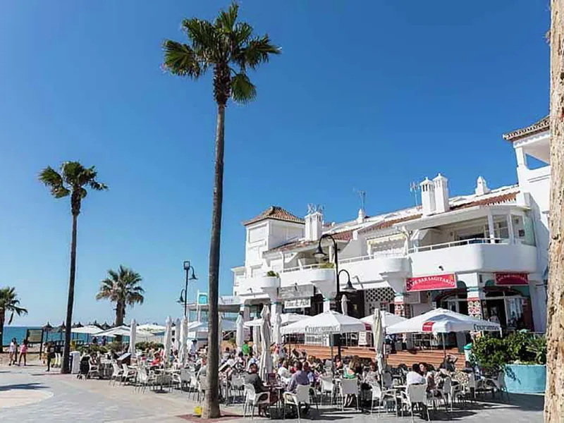 YOUR SECOND HOME AWAITS YOU! Discover refined Mediterranean living in this stylish contemporary apartment in the highly desirable area of Cala de Mijas, Mijas Costa. Nestled within an exclusive gated community (2021)and just a short stroll from the vibran