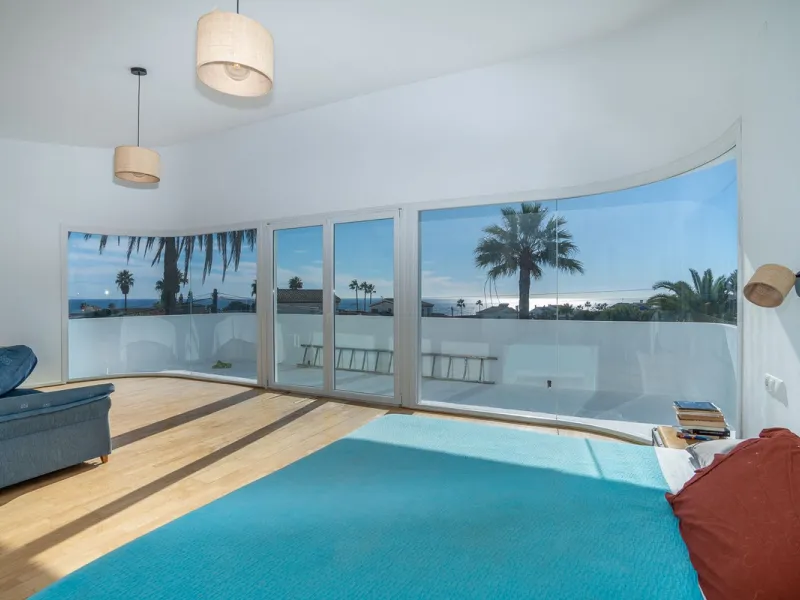 This modern villa has been recently renovated and sits in a fantastic location just 500 metres from the beach,  between La Cala de Mijas and Fuengirola. The home has a bright, contemporary feel throughout, with large windows that open onto the garden and 
