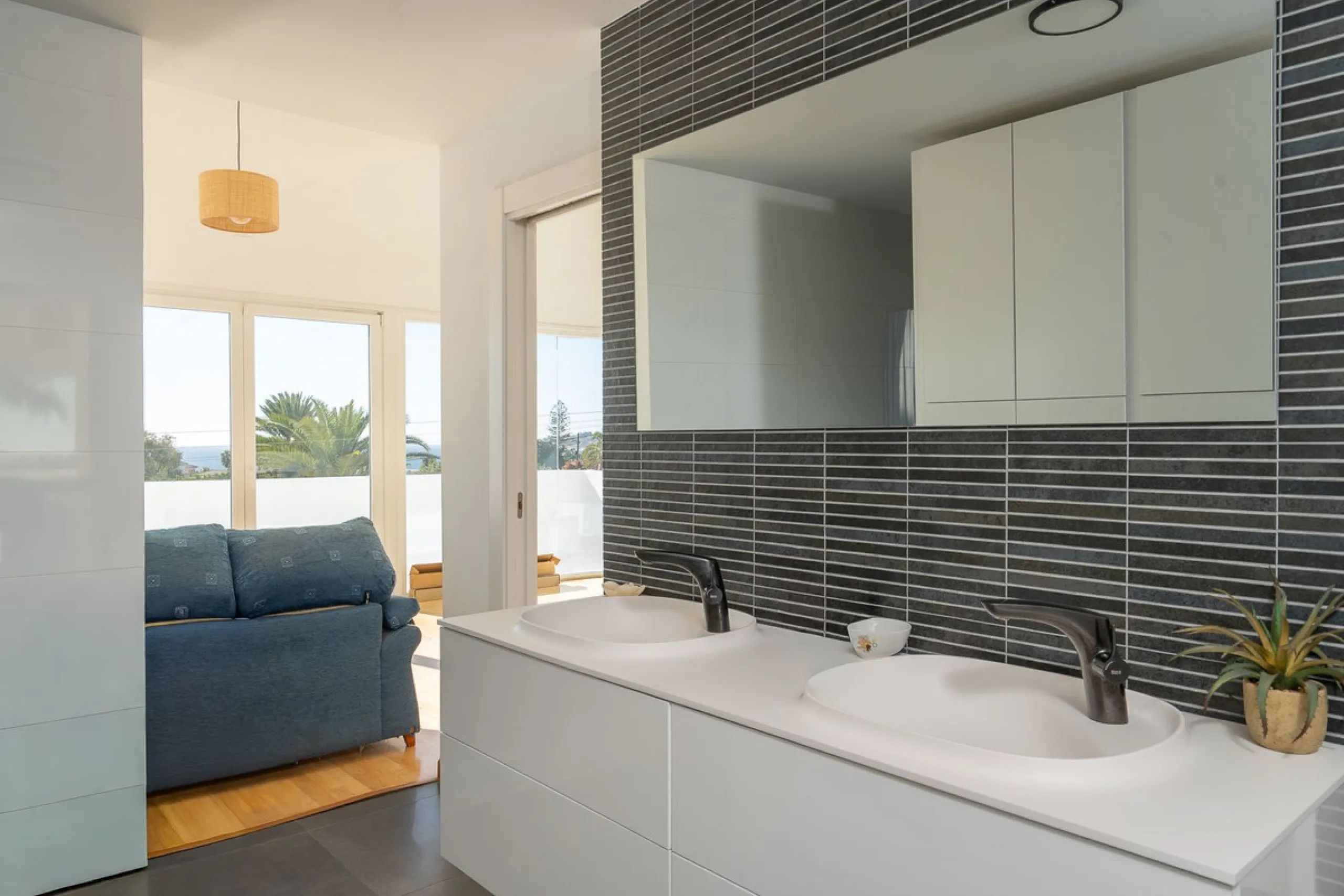 This modern villa has been recently renovated and sits in a fantastic location just 500 metres from the beach,  between La Cala de Mijas and Fuengirola. The home has a bright, contemporary feel throughout, with large windows that open onto the garden and 