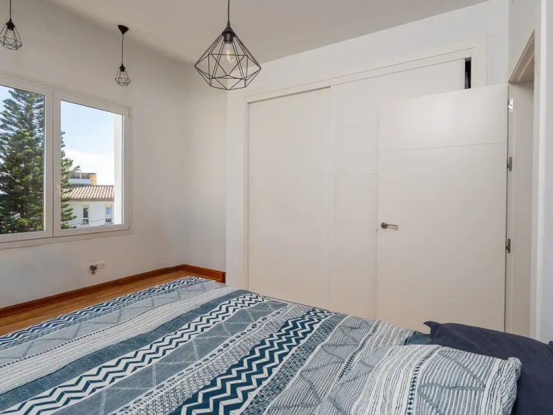 This modern villa has been recently renovated and sits in a fantastic location just 500 metres from the beach,  between La Cala de Mijas and Fuengirola. The home has a bright, contemporary feel throughout, with large windows that open onto the garden and 