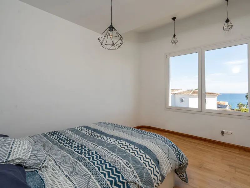 This modern villa has been recently renovated and sits in a fantastic location just 500 metres from the beach,  between La Cala de Mijas and Fuengirola. The home has a bright, contemporary feel throughout, with large windows that open onto the garden and 