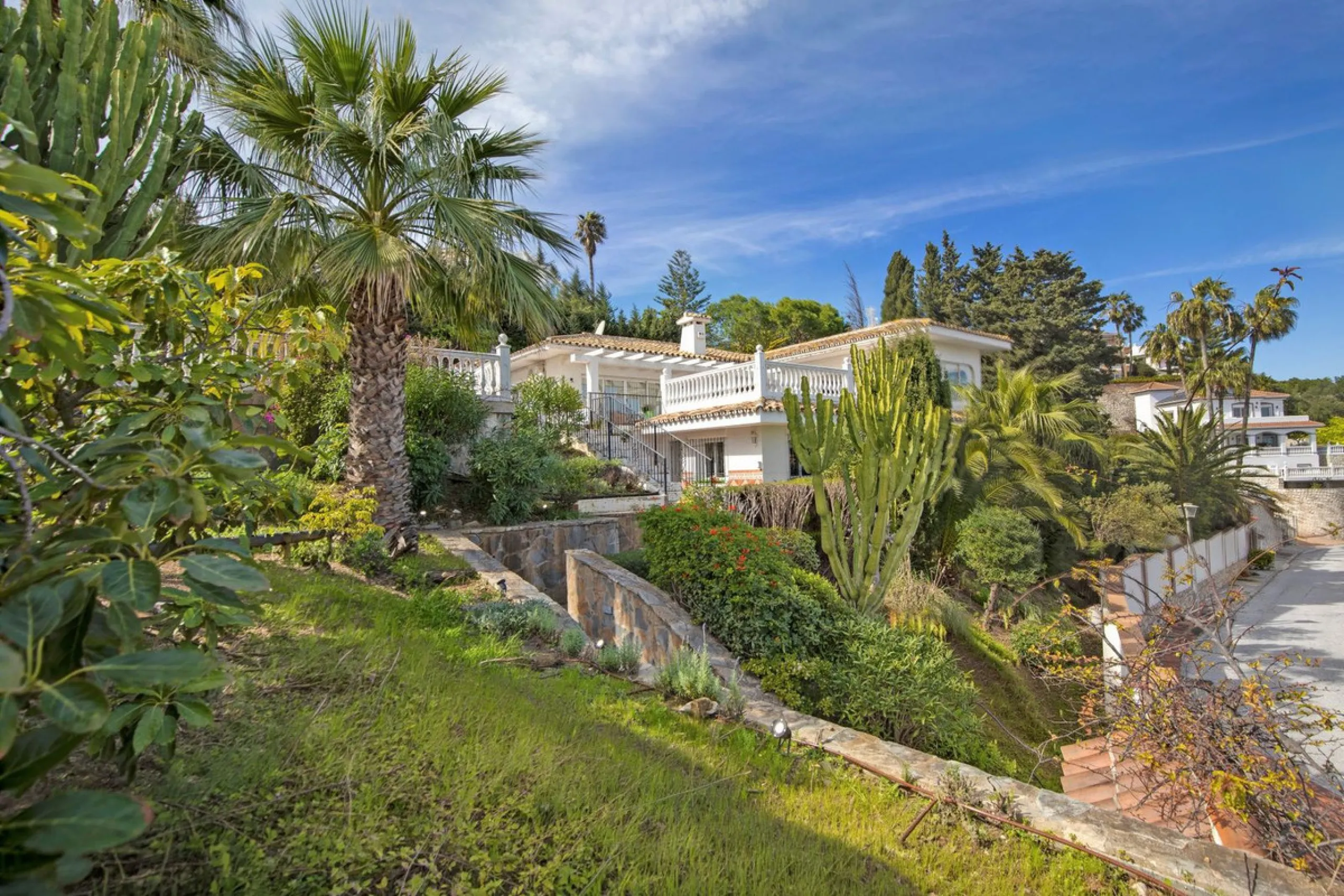 In a well-established and peaceful residential area, this villa enjoys an elevated position that allows for truly stunning open views of the Mediterranean and an uncommon level of privacy.