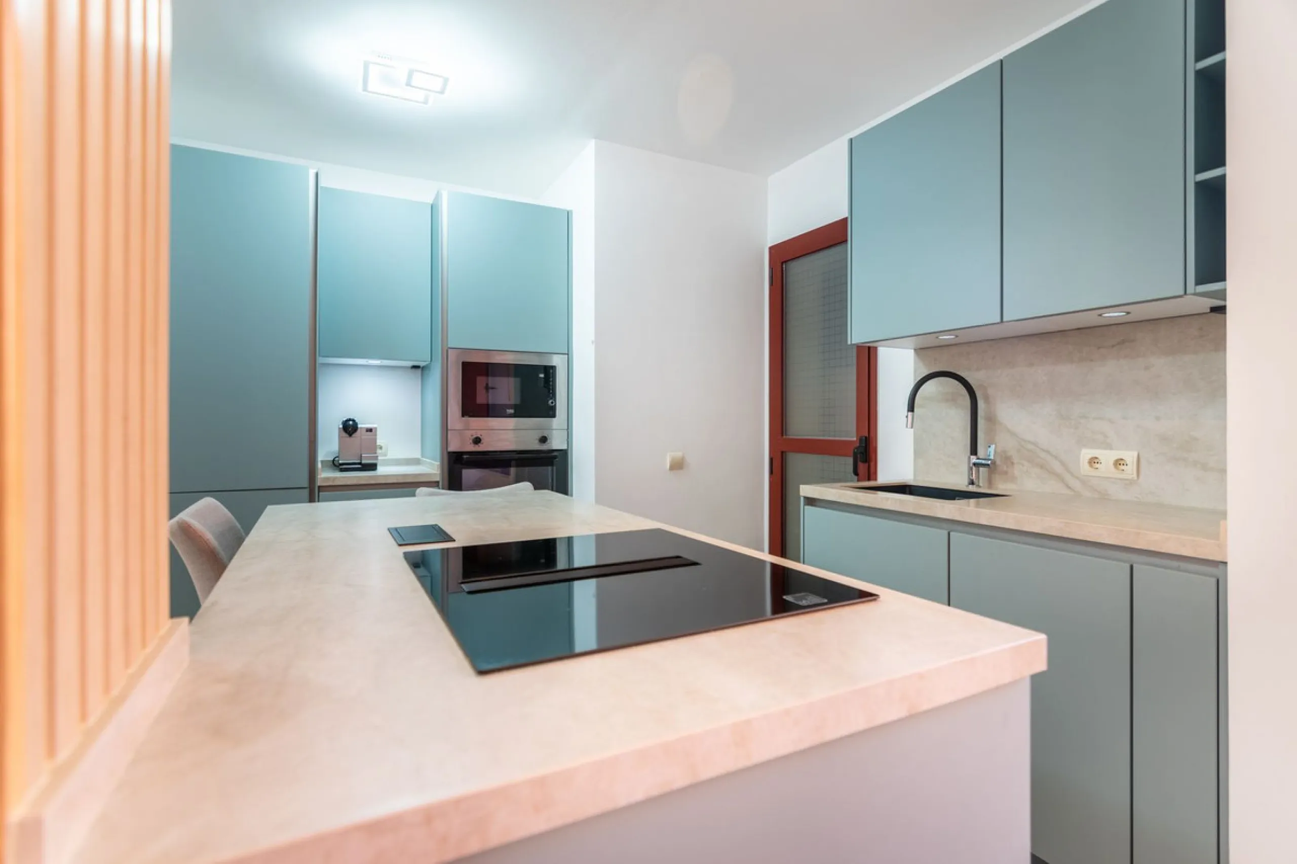 An apartment with 3 bedrooms, 2 bathrooms, a spacious living room, and a new kitchen with a dining area overlooking a beautiful garden with a fountain. The property is located in a unique, lush residential community where the views from the terrace and wi