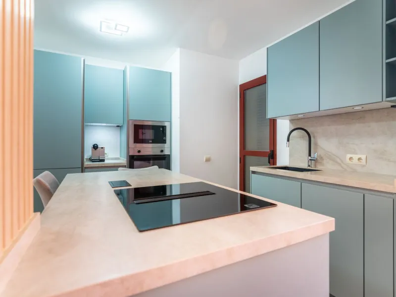 An apartment with 3 bedrooms, 2 bathrooms, a spacious living room, and a new kitchen with a dining area overlooking a beautiful garden with a fountain. The property is located in a unique, lush residential community where the views from the terrace and wi