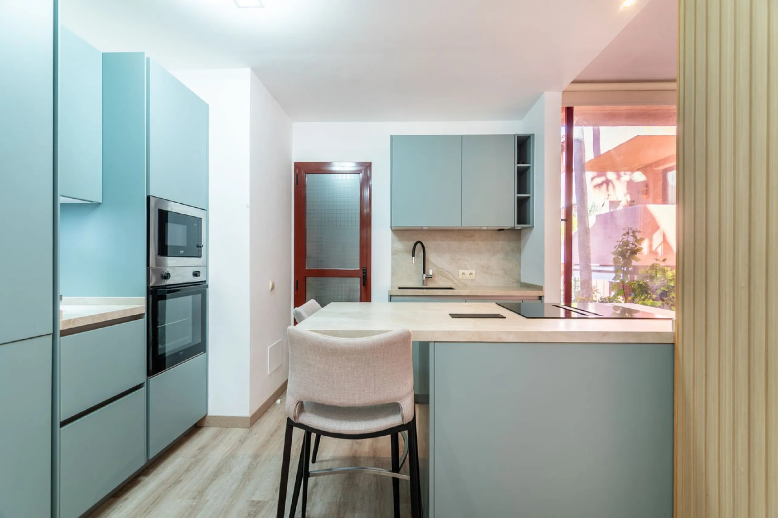 An apartment with 3 bedrooms, 2 bathrooms, a spacious living room, and a new kitchen with a dining area overlooking a beautiful garden with a fountain. The property is located in a unique, lush residential community where the views from the terrace and wi