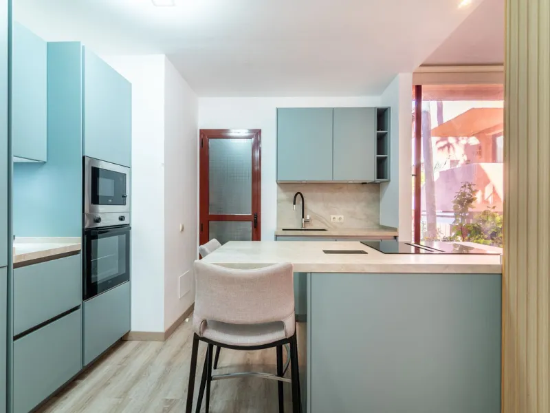 An apartment with 3 bedrooms, 2 bathrooms, a spacious living room, and a new kitchen with a dining area overlooking a beautiful garden with a fountain. The property is located in a unique, lush residential community where the views from the terrace and wi
