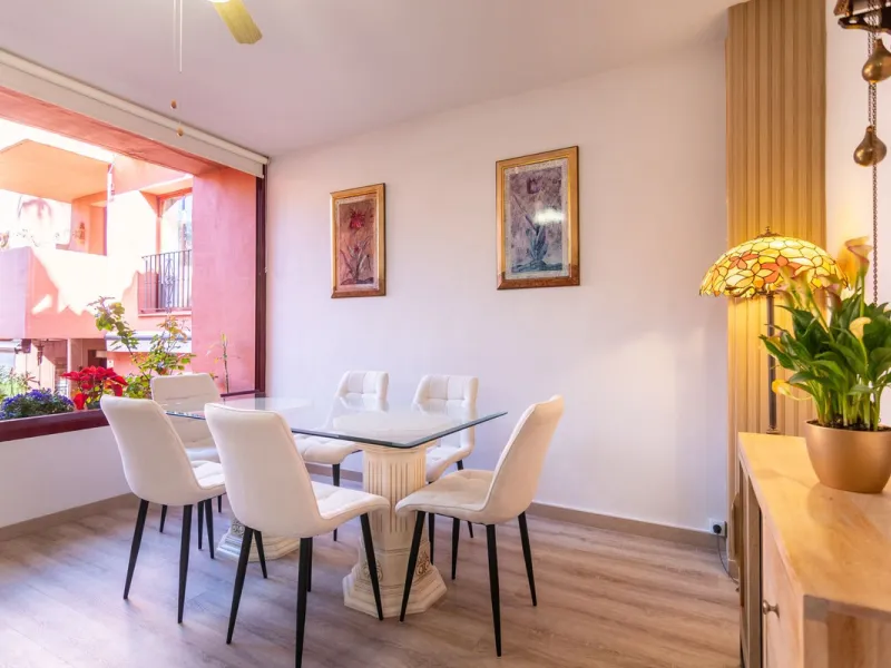 An apartment with 3 bedrooms, 2 bathrooms, a spacious living room, and a new kitchen with a dining area overlooking a beautiful garden with a fountain. The property is located in a unique, lush residential community where the views from the terrace and wi