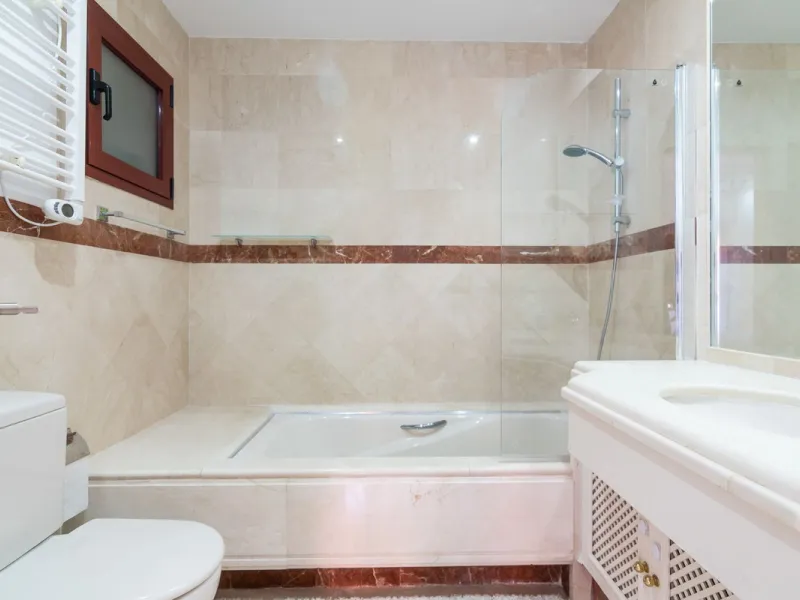 An apartment with 3 bedrooms, 2 bathrooms, a spacious living room, and a new kitchen with a dining area overlooking a beautiful garden with a fountain. The property is located in a unique, lush residential community where the views from the terrace and wi