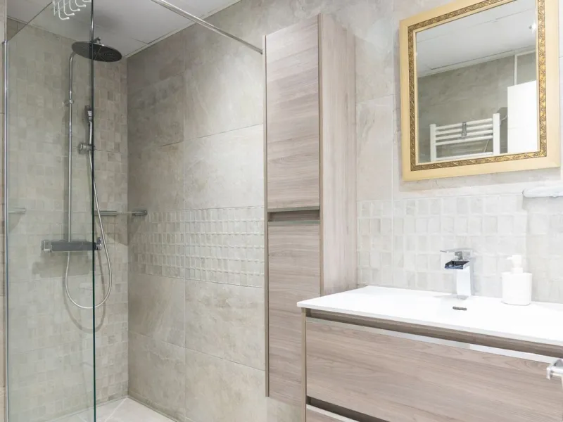 An apartment with 3 bedrooms, 2 bathrooms, a spacious living room, and a new kitchen with a dining area overlooking a beautiful garden with a fountain. The property is located in a unique, lush residential community where the views from the terrace and wi