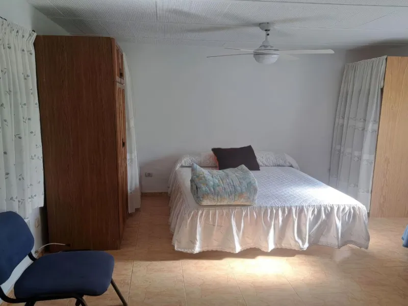 This rustic country property in a wonderful location offers buyers the possibility to create two separate houses, each with its own entrance on a flat piece of land less than a 20-minute drive to Málaga city and the airport.