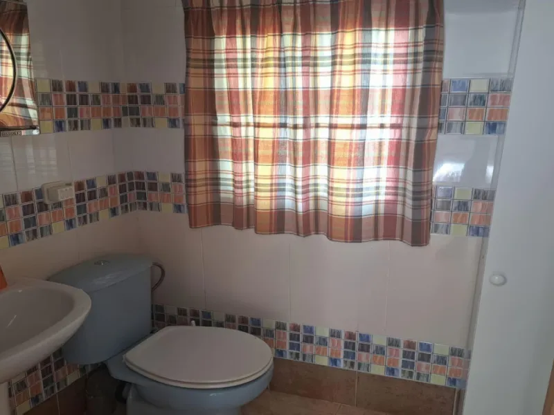 This rustic country property in a wonderful location offers buyers the possibility to create two separate houses, each with its own entrance on a flat piece of land less than a 20-minute drive to Málaga city and the airport.