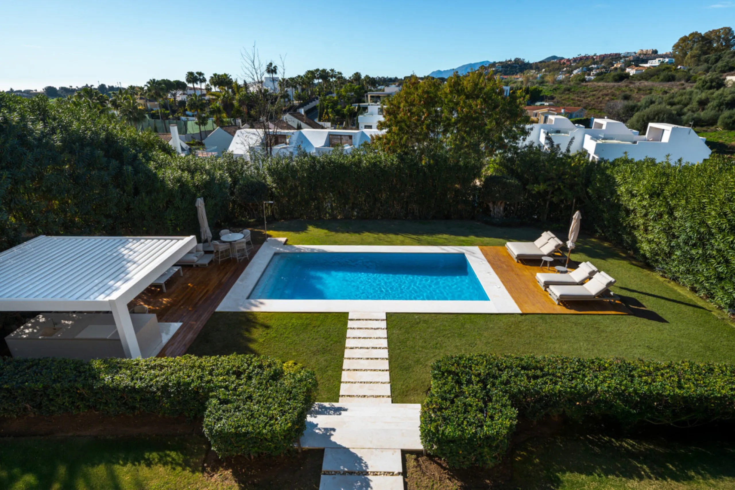 Set within the prestigious, fully gated Los Olivos community with 24/7 security, this contemporary villa sits on the largest plot in the development, offering unmatched privacy, space, and a prime location. Occupying a generous 1,351 m² plot, the property