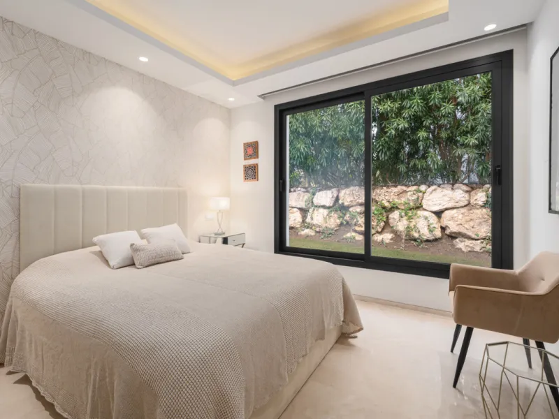 Set within the prestigious, fully gated Los Olivos community with 24/7 security, this contemporary villa sits on the largest plot in the development, offering unmatched privacy, space, and a prime location. Occupying a generous 1,351 m² plot, the property