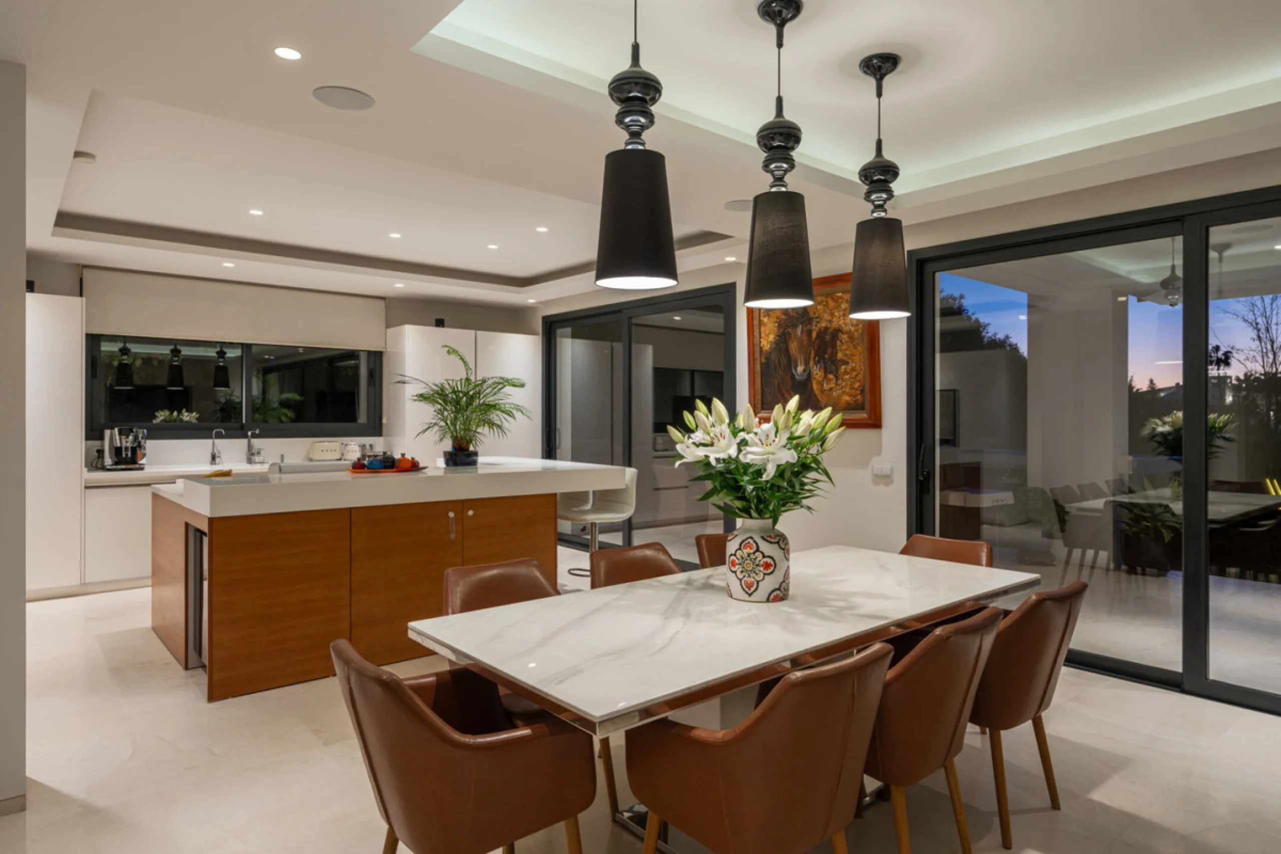 Set within the prestigious, fully gated Los Olivos community with 24/7 security, this contemporary villa sits on the largest plot in the development, offering unmatched privacy, space, and a prime location. Occupying a generous 1,351 m² plot, the property