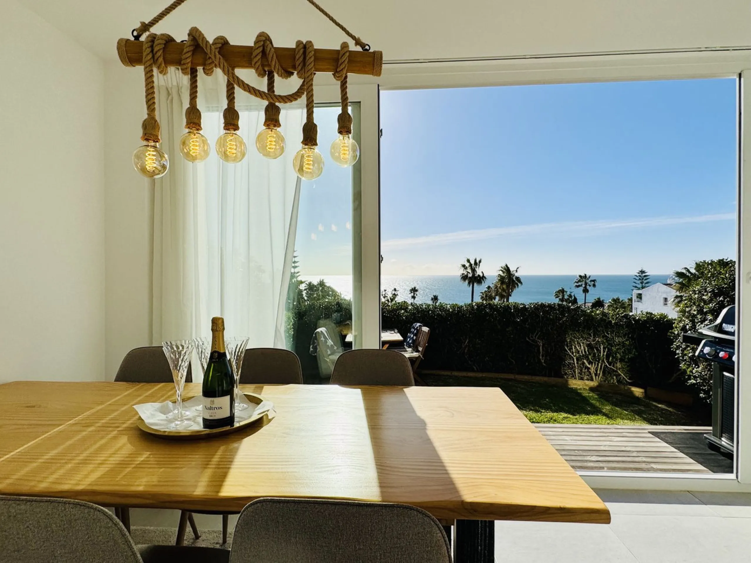 Stylish, fully renovated townhouse in the heart of Mijas Costa just steps from Fuengirola's beach walk, ideal as a permanent home, holiday residence or investement with excellent rental potential.