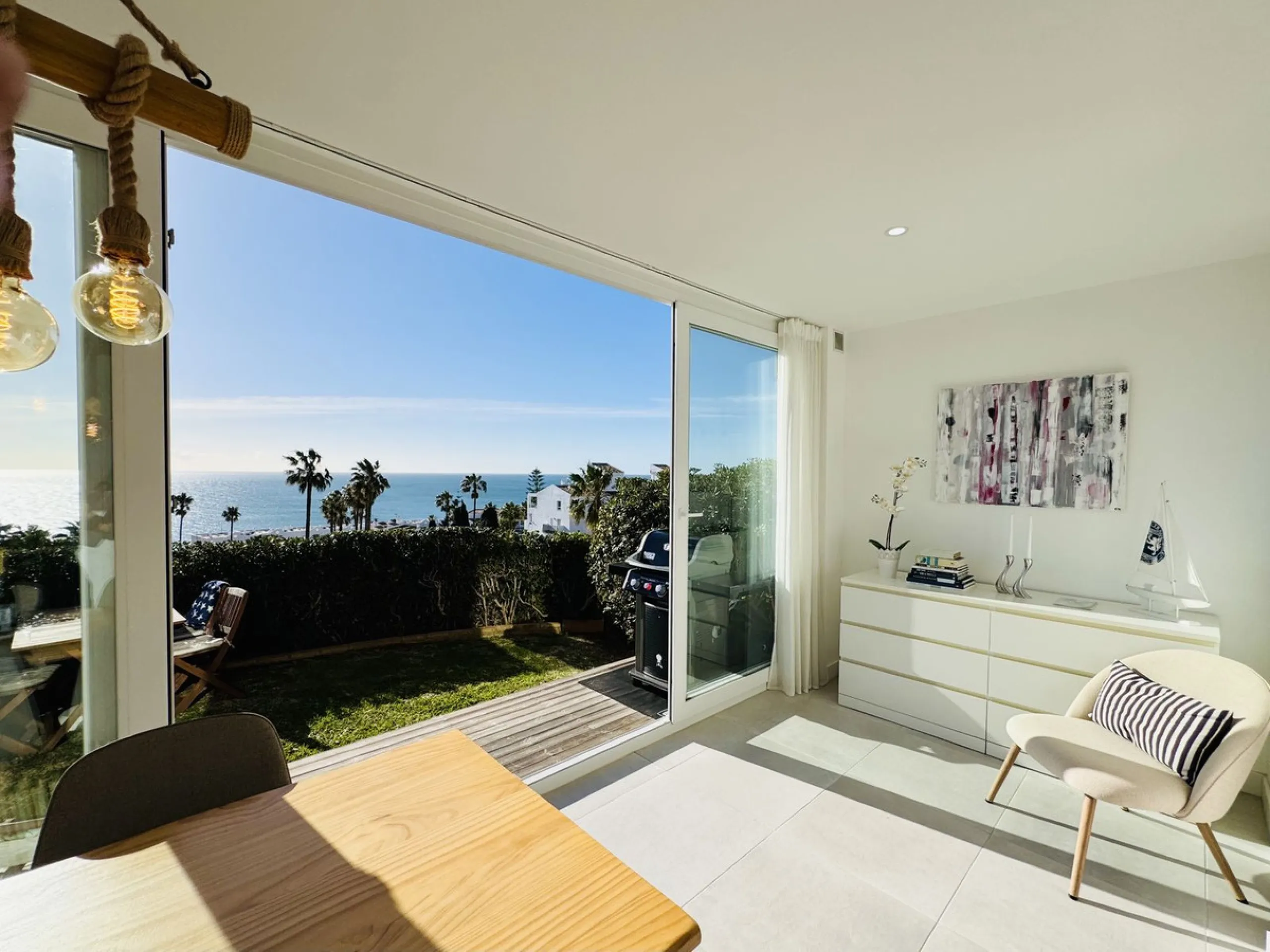 Stylish, fully renovated townhouse in the heart of Mijas Costa just steps from Fuengirola's beach walk, ideal as a permanent home, holiday residence or investement with excellent rental potential.