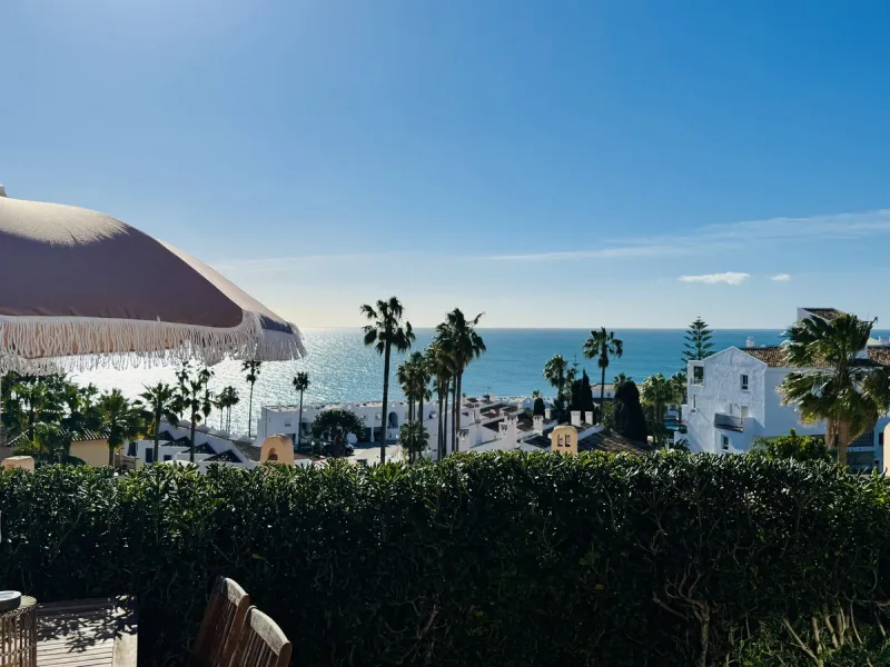Stylish, fully renovated townhouse in the heart of Mijas Costa just steps from Fuengirola's beach walk, ideal as a permanent home, holiday residence or investement with excellent rental potential.