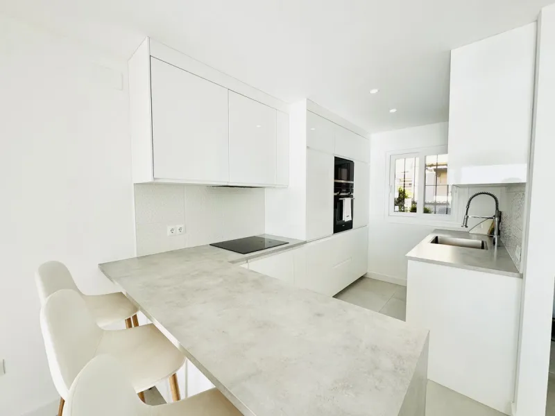 Stylish, fully renovated townhouse in the heart of Mijas Costa just steps from Fuengirola's beach walk, ideal as a permanent home, holiday residence or investement with excellent rental potential.