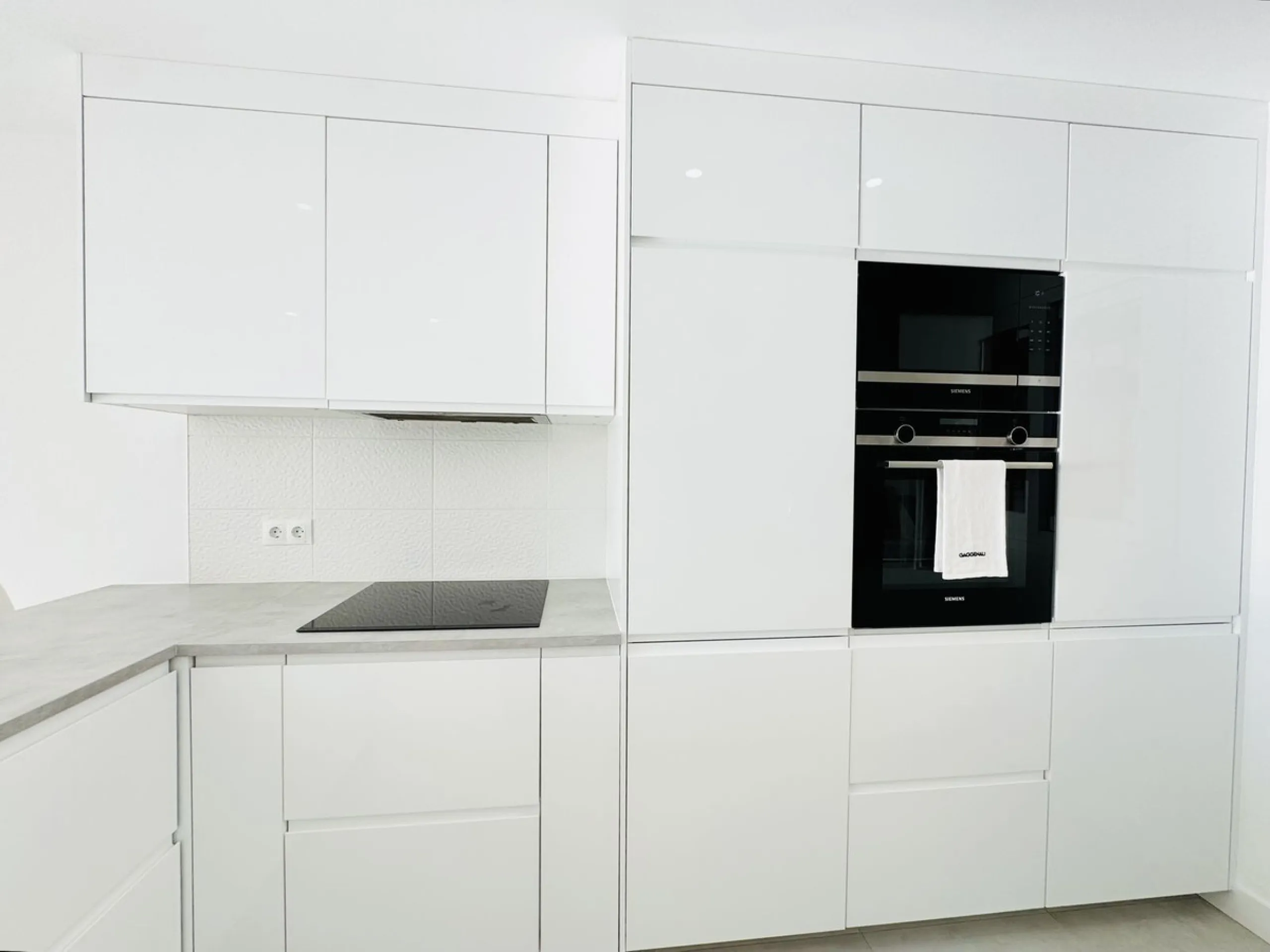 Stylish, fully renovated townhouse in the heart of Mijas Costa just steps from Fuengirola's beach walk, ideal as a permanent home, holiday residence or investement with excellent rental potential.
