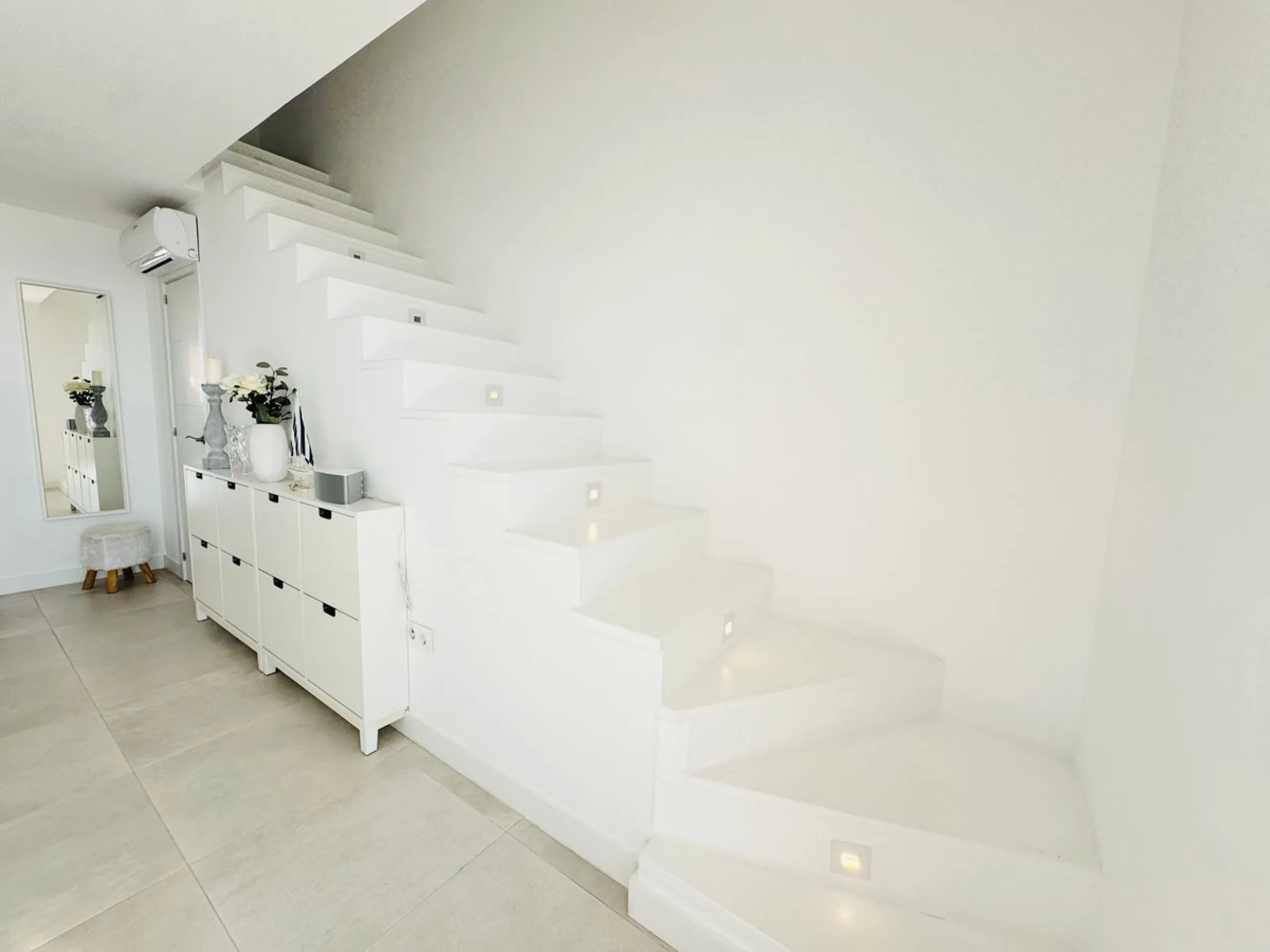 Stylish, fully renovated townhouse in the heart of Mijas Costa just steps from Fuengirola's beach walk, ideal as a permanent home, holiday residence or investement with excellent rental potential.