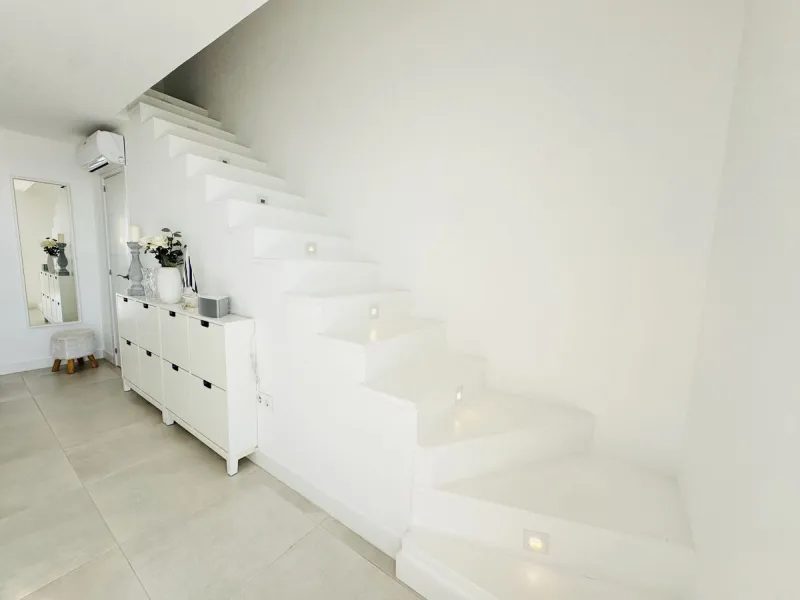 Stylish, fully renovated townhouse in the heart of Mijas Costa just steps from Fuengirola's beach walk, ideal as a permanent home, holiday residence or investement with excellent rental potential.